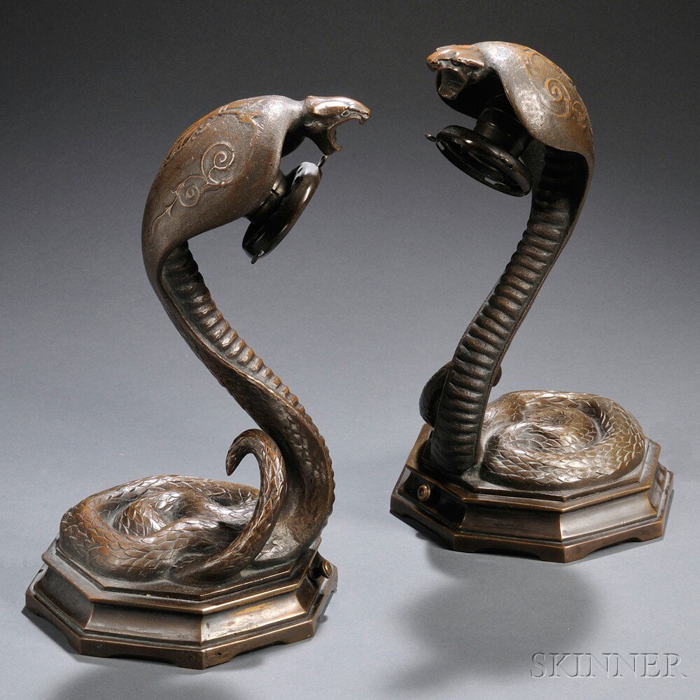 Appraisal: Pair of Bronze Cobra Lamps late th early th century