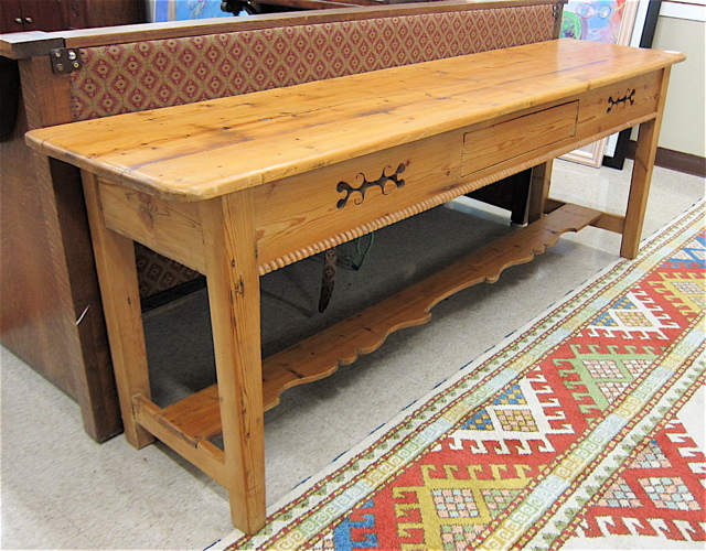 Appraisal: LONG PINE SOFA TABLE the long rectangular top overhanging a