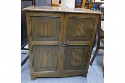 Appraisal: Oak linen fold drinks cabinet