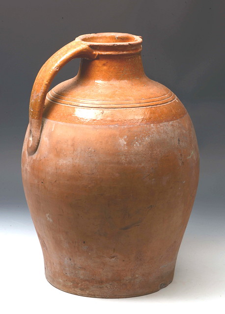 Appraisal: A LARGE TH CENTURY ENGLISH TERRACOTTA OVOID HARVEST JUG with