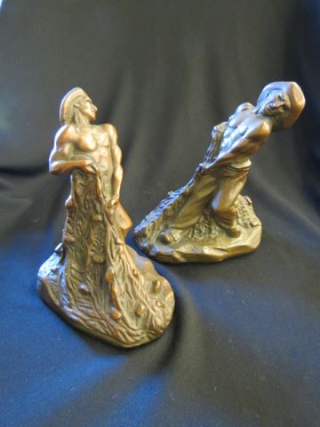 Appraisal: Pair of Bronzed Figural Bookends Bringing in the Catch art