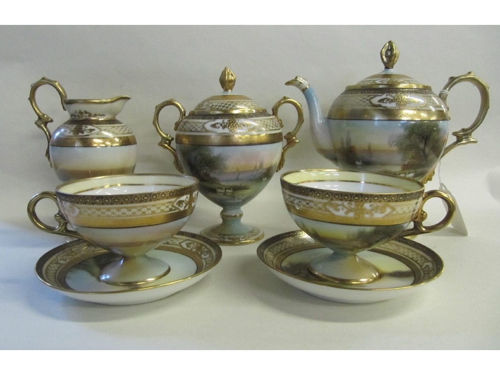 Appraisal: Noritake tea for two teaset painted with swans in a