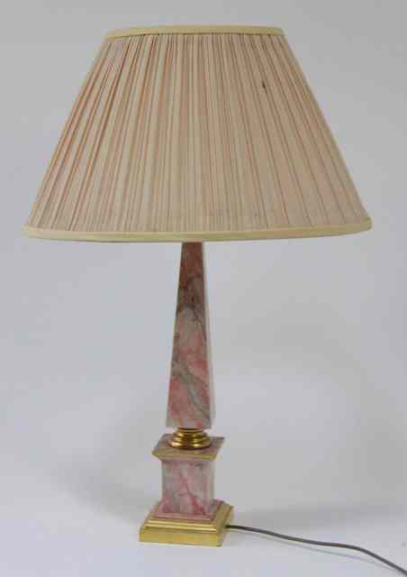 Appraisal: A marbled table light of obelisk form with gilt socle