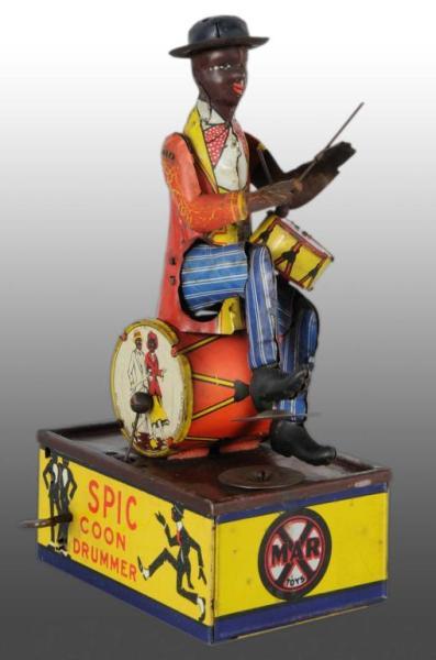 Appraisal: Tin Marx Spic The Coon Drummer Wind-Up Toy Description American