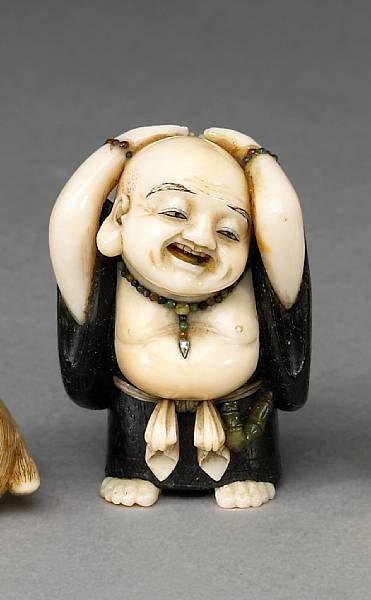 Appraisal: Netsuke and Okimono Standing with his hands on his head