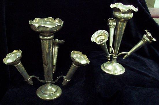 Appraisal: An epergne the central taper vase supporting three smaller vases