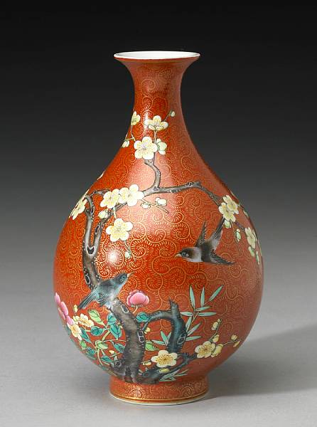 Appraisal: A coral red ground porcelain vase with famille rose decoration