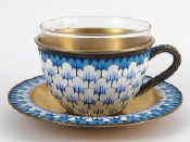 Appraisal: A Soviet Russian silver gilt enamelled teacup and saucer with