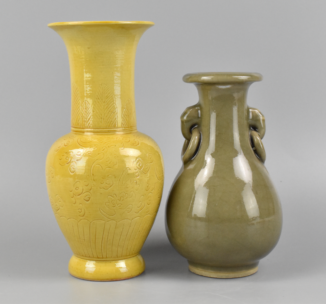 Appraisal: A Chinese yellow and celadon glazed vase The yellow taller