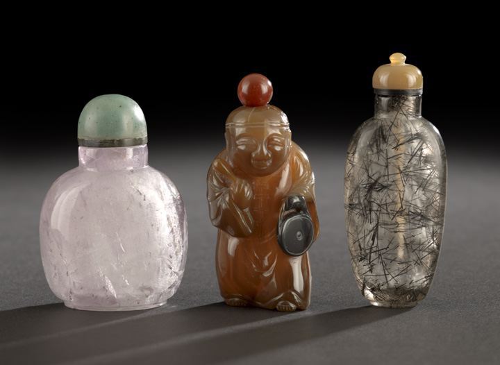 Appraisal: Group of Three Chinese Stone Snuff Bottles composed of a