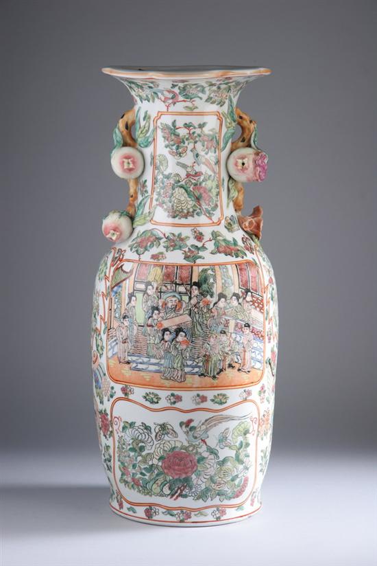 Appraisal: CHINESE FAMILLE ROSE PORCELAIN BALUSTER VASE th century Peach-form handles