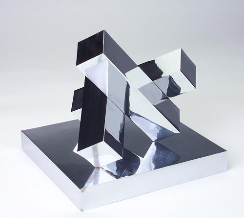 Appraisal: IRVING RICHARDS Bright chrome abstract table sculpture Richards was an