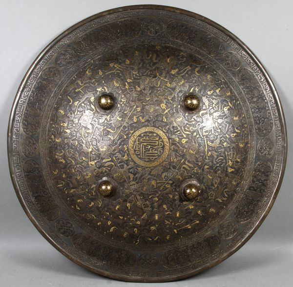 Appraisal: Rare th Century Persian Islamic embossed iron shield with gold