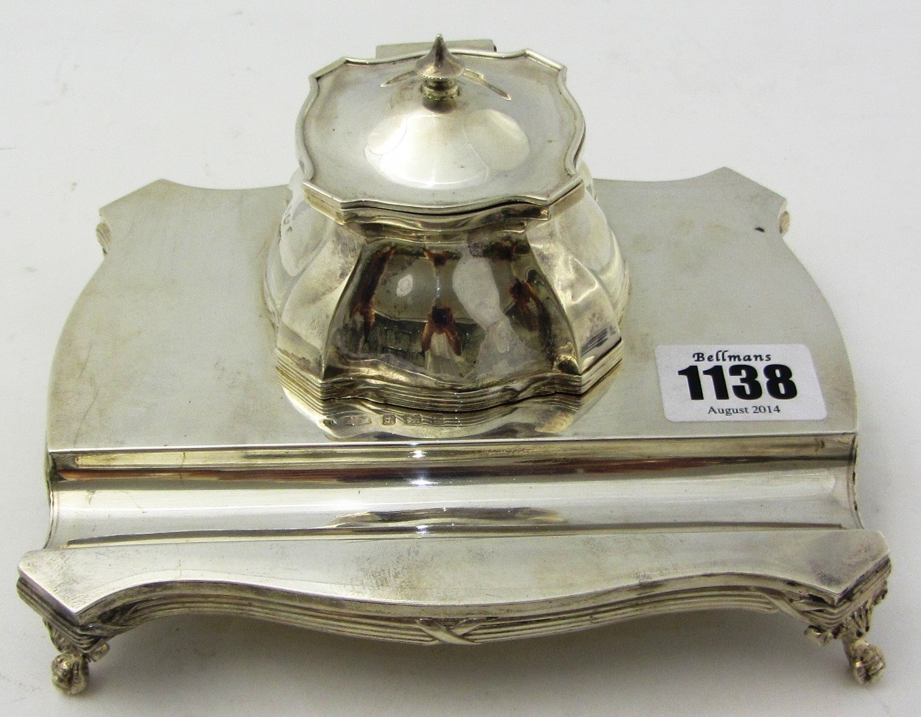 Appraisal: A silver shaped rectangular inkstand with a hinged cover the