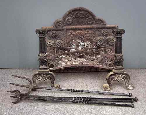 Appraisal: A cast iron fire back of '' th Century'' design