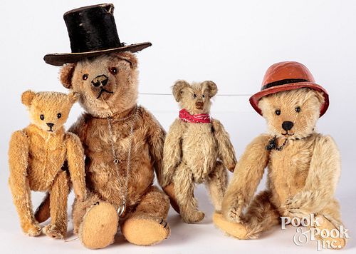 Appraisal: FOUR EARLY STUFFED MOHAIR TEDDY BEARSFour early stuffed mohair teddy