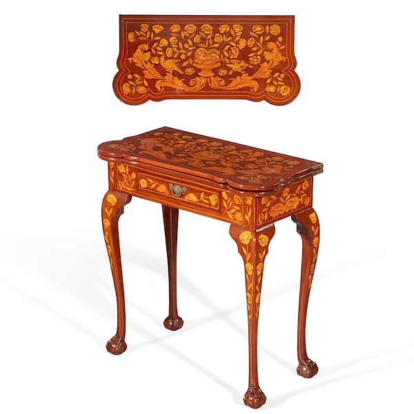 Appraisal: A Dutch mahogany marquetry fold over card table A Dutch