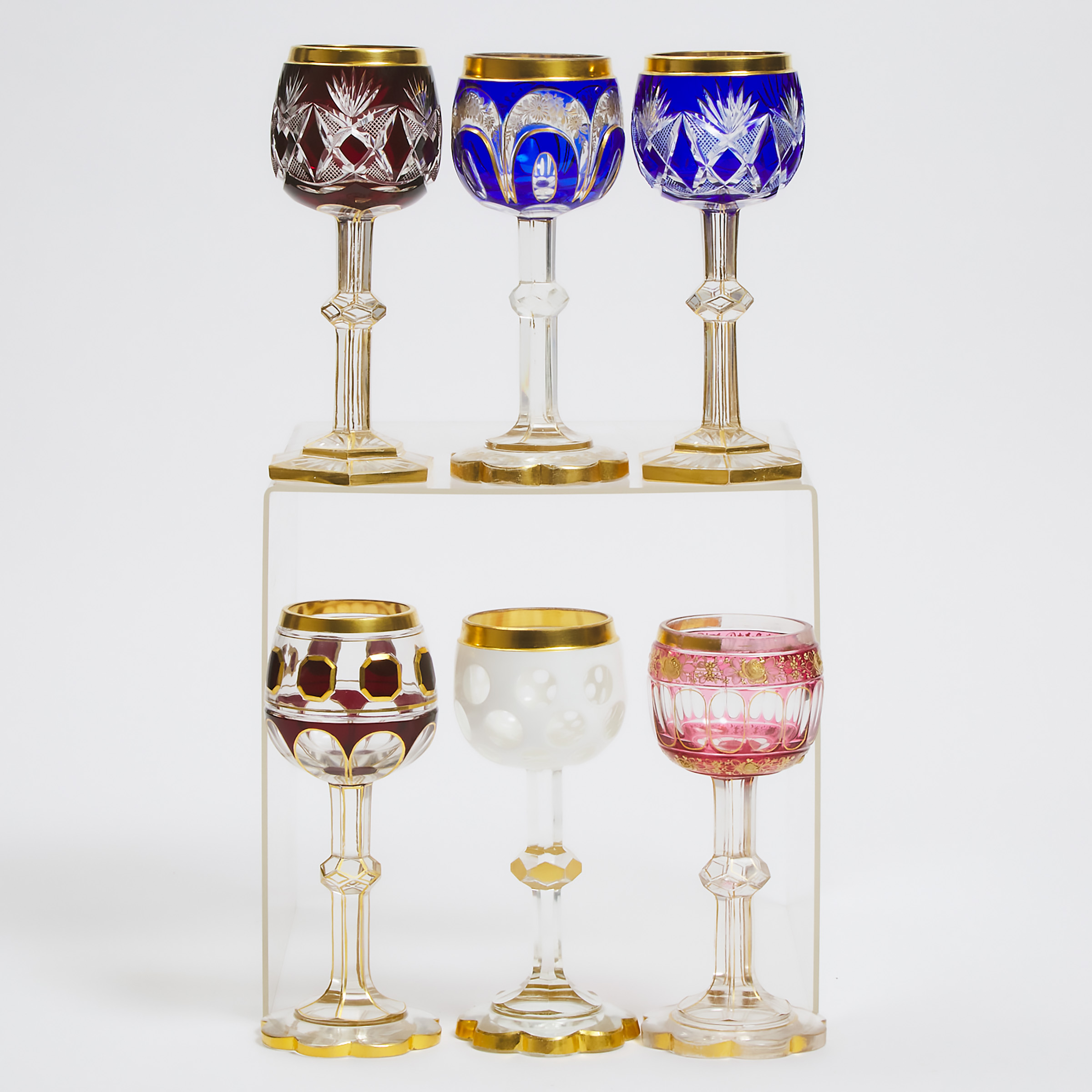 Appraisal: Six Bohemian Overlaid Cut and Gilt Glass Wine Goblets late