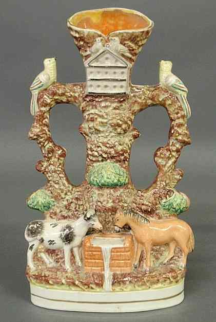 Appraisal: Staffordshire spill vase with a cow and horse drinking from