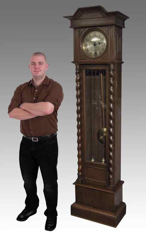 Appraisal: GERMAN DECO BARLEY TWIST GRANDFATHER CLOCK Carved case with shaped