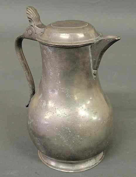 Appraisal: Pewter covered baluster form pitcher with touchmark of a winged