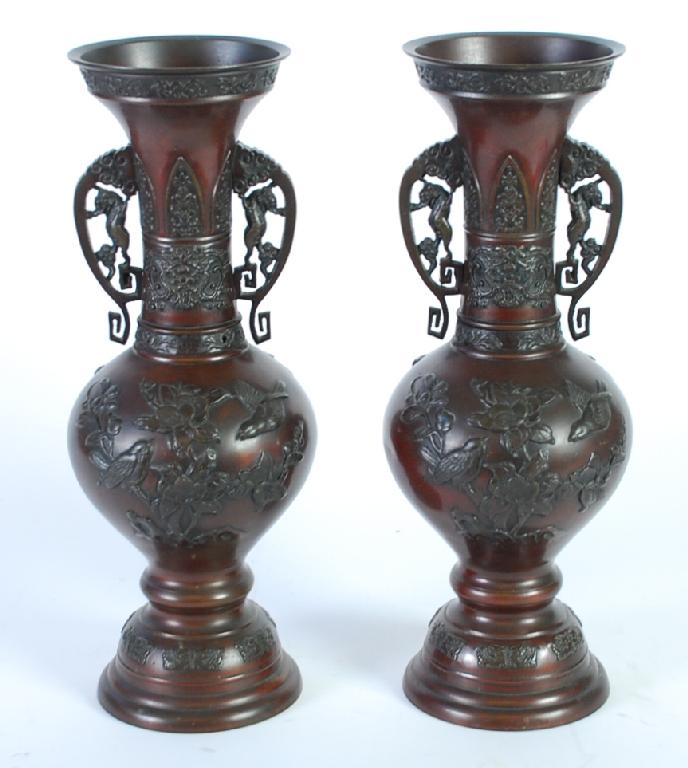 Appraisal: PAIR OF JAPANESE BRONZE TWO HANDLED LONG NECKED VASES the