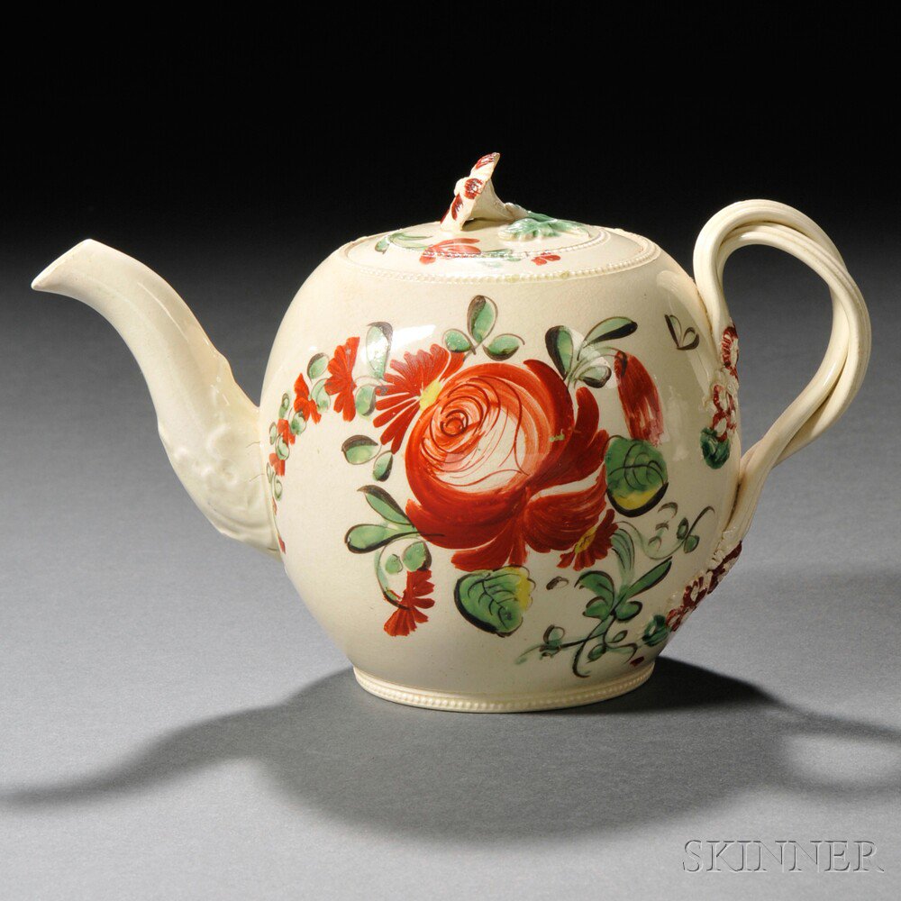 Appraisal: Staffordshire Cream-colored Earthenware Teapot and Cover England c globular with