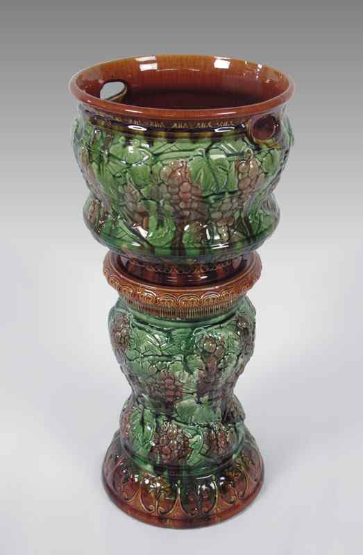 Appraisal: MCCOY GRAPE VINE JARDINIERE AND PEDESTAL To include jardiniere marked