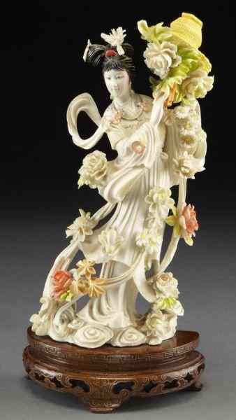 Appraisal: Chinese carved polychrome ivory lady International buyers should note that