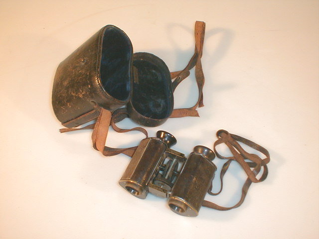 Appraisal: A pair of Georz binoculars with presentation silver plaque inscribed