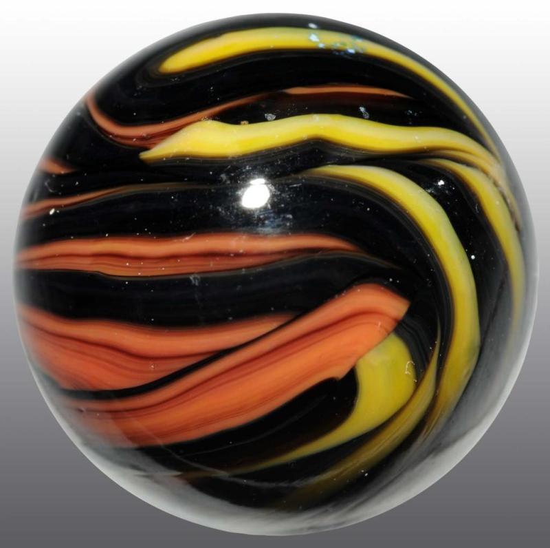 Appraisal: Christensen Tri-Colored Flame Marble Description Black brown and yellow Great