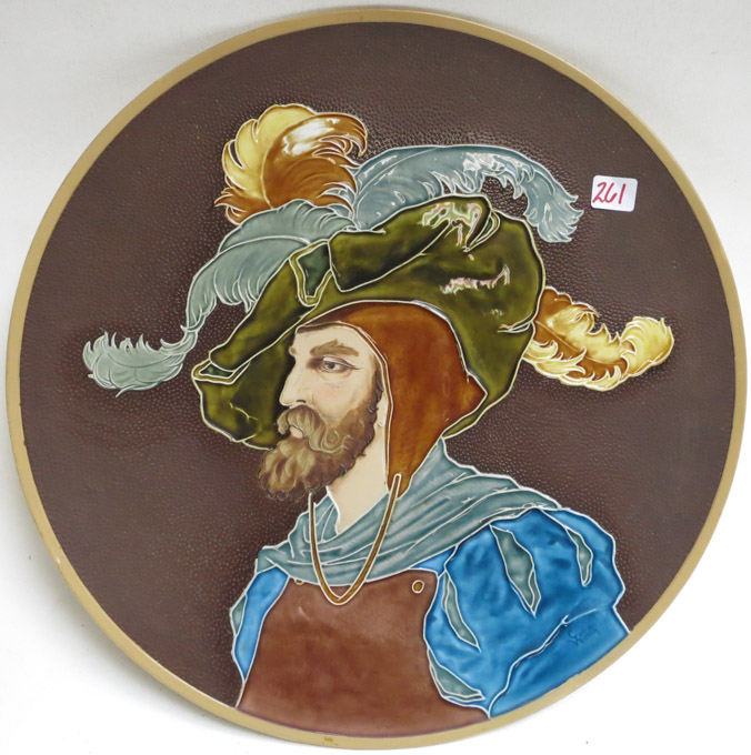 Appraisal: METTLACH ETCHED AND GLAZED POTTERY PLAQUE Bearded Man with Fancy