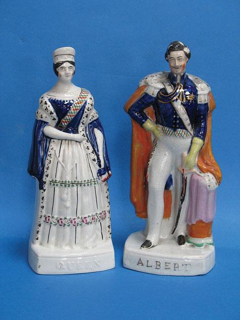 Appraisal: COMMEMORATIVE A PAIR OF STAFFORDSHIRE FIGURES Queen Victoria and Prince