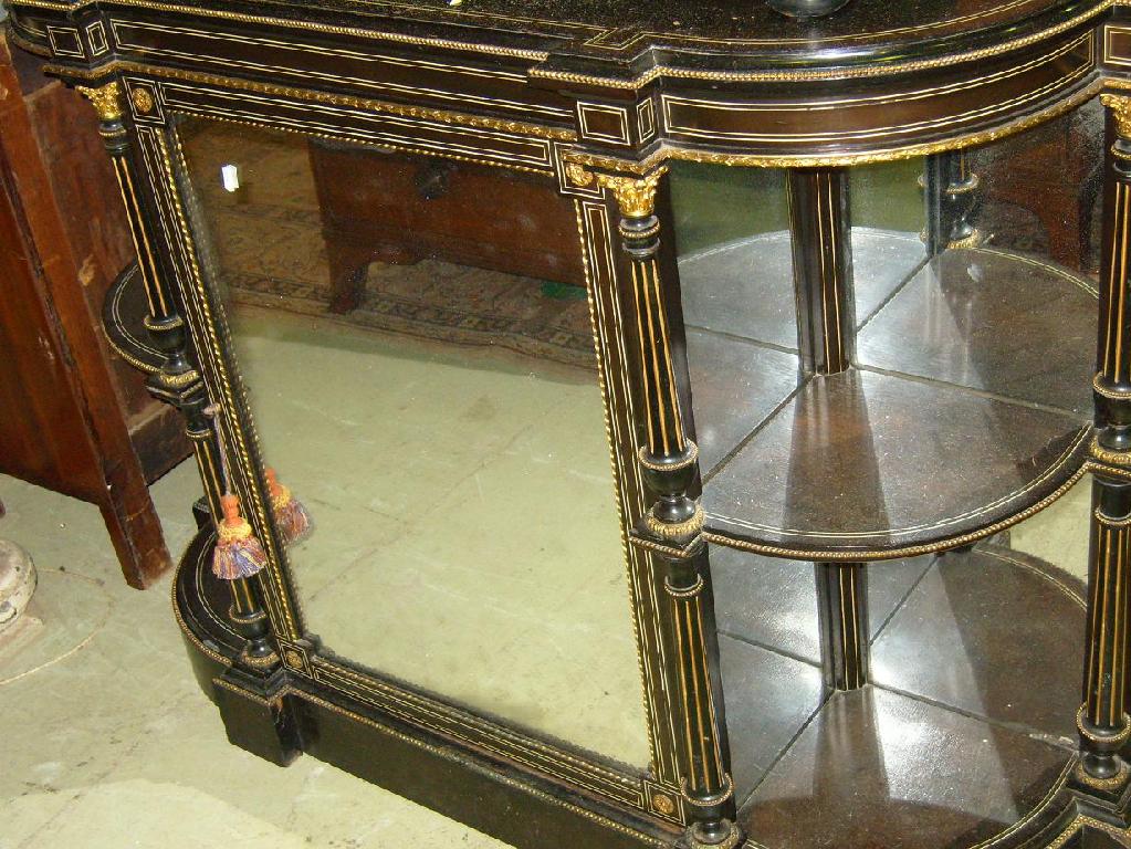 Appraisal: A Victorian ebonised side cupboard enclosed by a single mirror