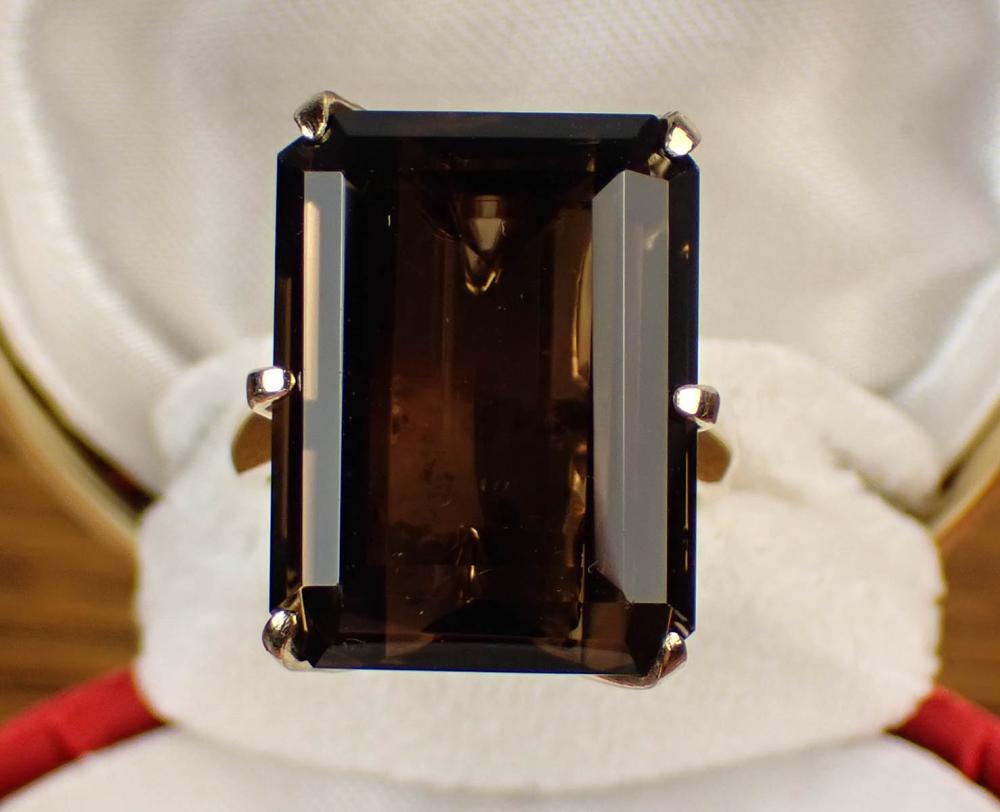 Appraisal: SMOKY QUARTZ AND FOURTEEN KARAT GOLD SOLITAIRE RING with six