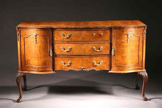 Appraisal: GEORGE II STYLE WALNUT SIDEBOARD Serpentine top with molded edge