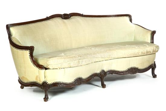 Appraisal: CARVED SOFA Early th century In the French taste serpentine