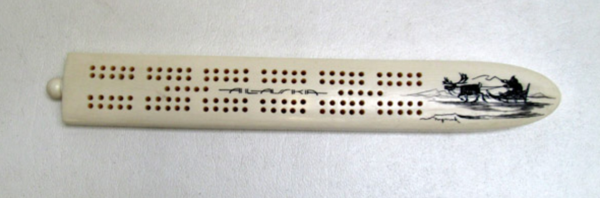 Appraisal: NUGURUK SCRIMSHAW IVORY CRIBBAGE BOARD in the Caribou and Eskimo