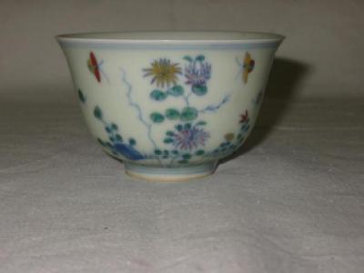 Appraisal: A PAIR OF CHINESE PORCELAIN TEA BOWLS blue painted and