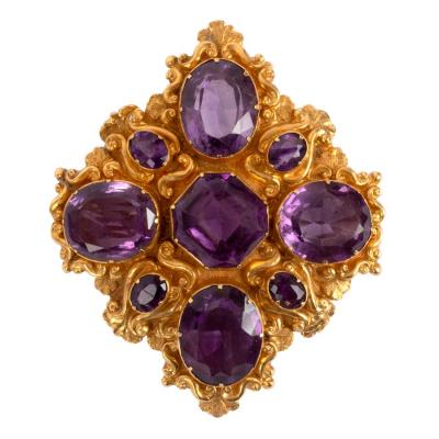 Appraisal: An amethyst set brooch converted from a Victorian clasp the