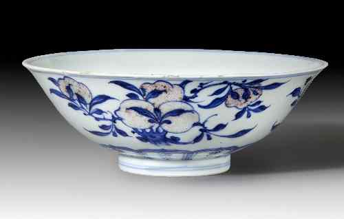 Appraisal: A Chinese underglaze blue and copper red porcelain 'Sanduo' bowl