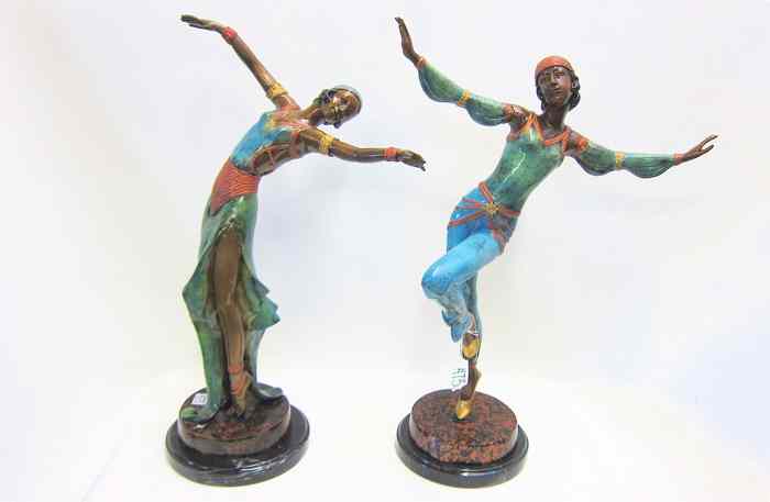 Appraisal: TWO FIGURAL POLYCHROME BRONZE SCULPTURES each of a female in