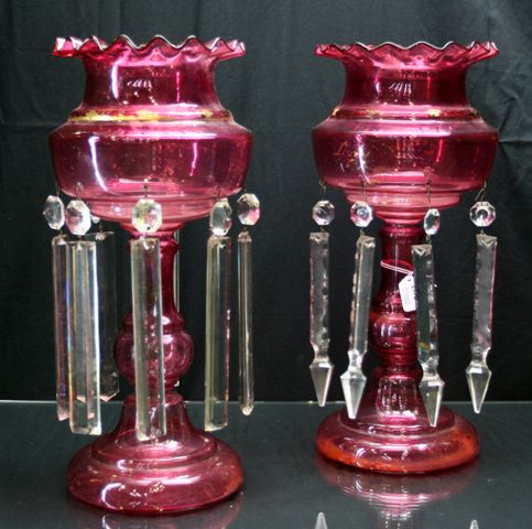 Appraisal: Pair of ruby glass lustres with prisms cms high