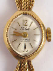 Appraisal: A carat gold lady's Pilot wristwatch with integral bracelet grams