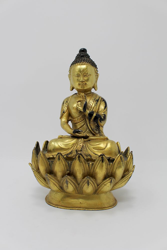 Appraisal: Gilt Bronze Seated Bhaishajyaguru Figure Gilt Bronze Seated Bhaishajyaguru Medicine