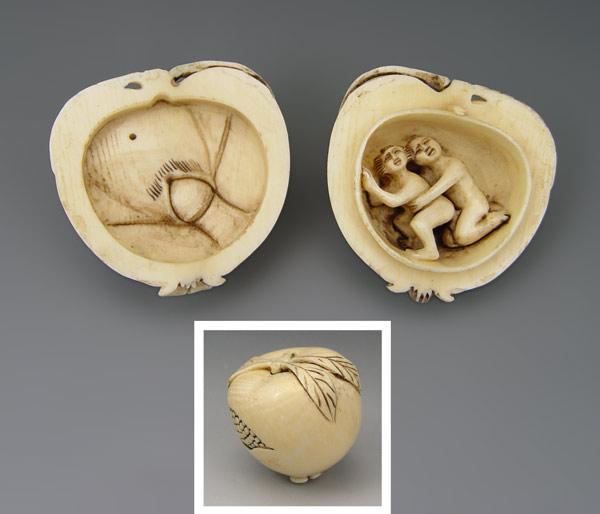 Appraisal: CARVED EROTIC IVORY NETSUKE IN FRUIT Carved plum or peach