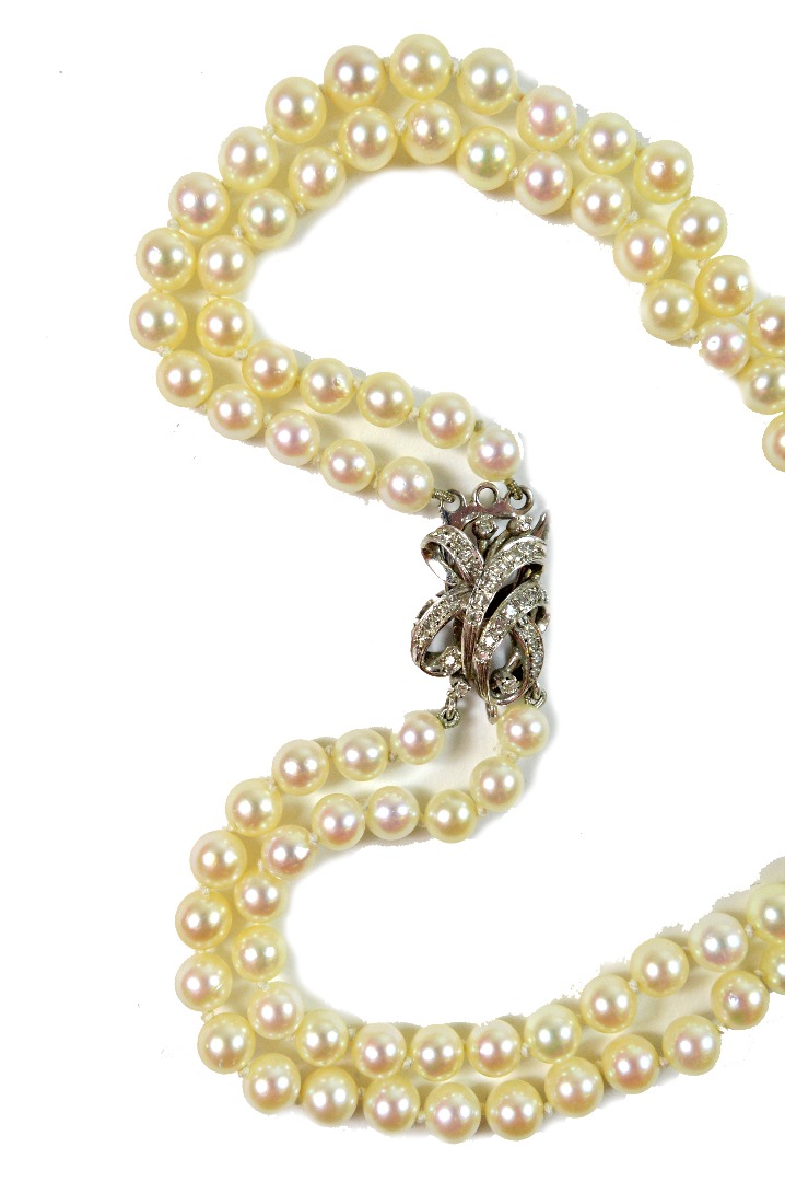 Appraisal: A two-row cultured pearl necklace on a white gold and