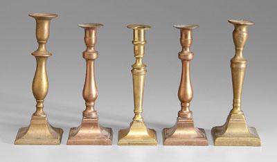 Appraisal: Five brass candlesticks all with square bases one marked in