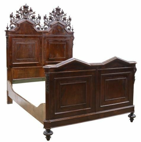 Appraisal: Italian carved walnut bed th c carved double crest with