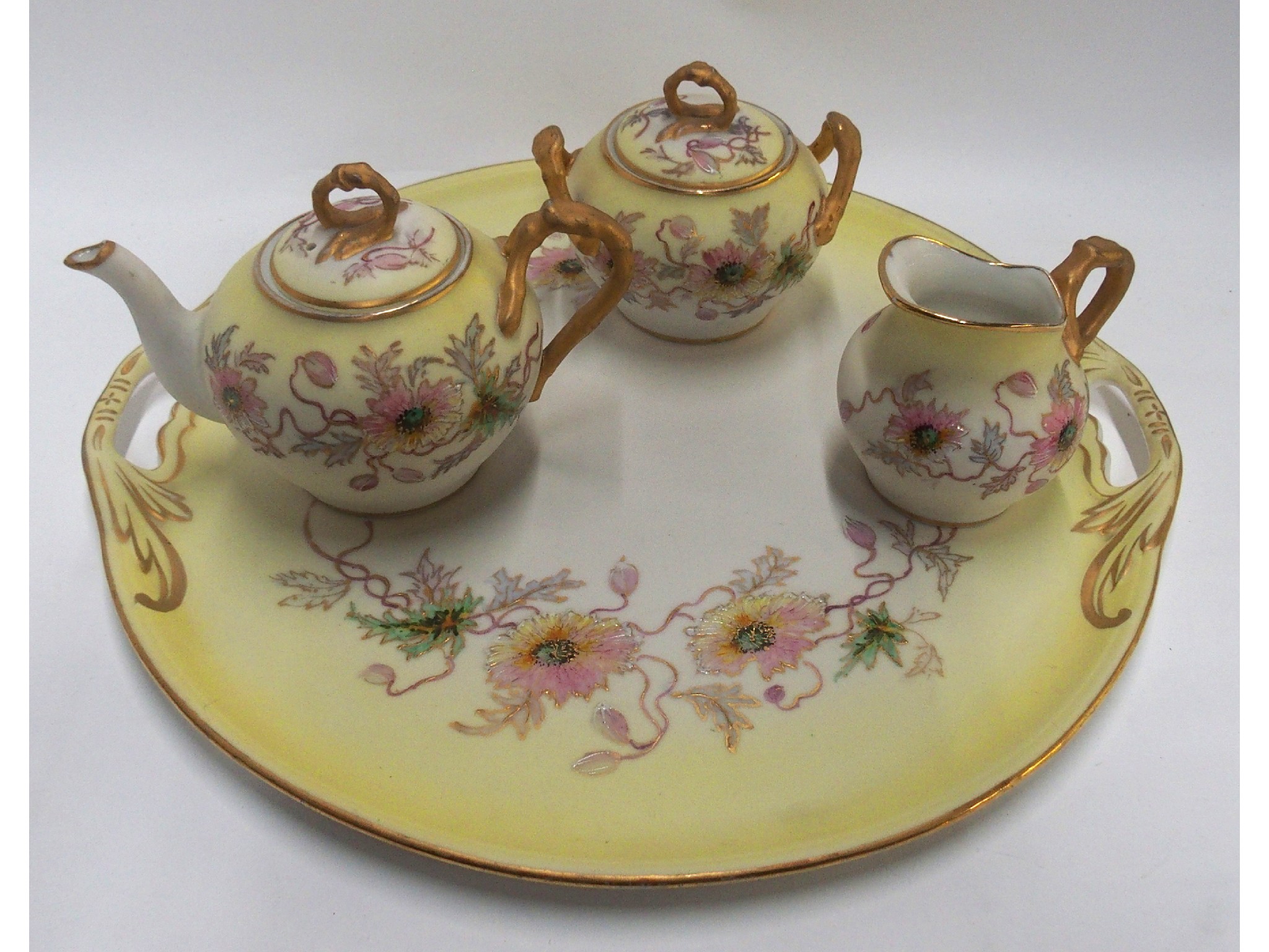 Appraisal: A W G Co French Limoges porcelain three piece teaservice